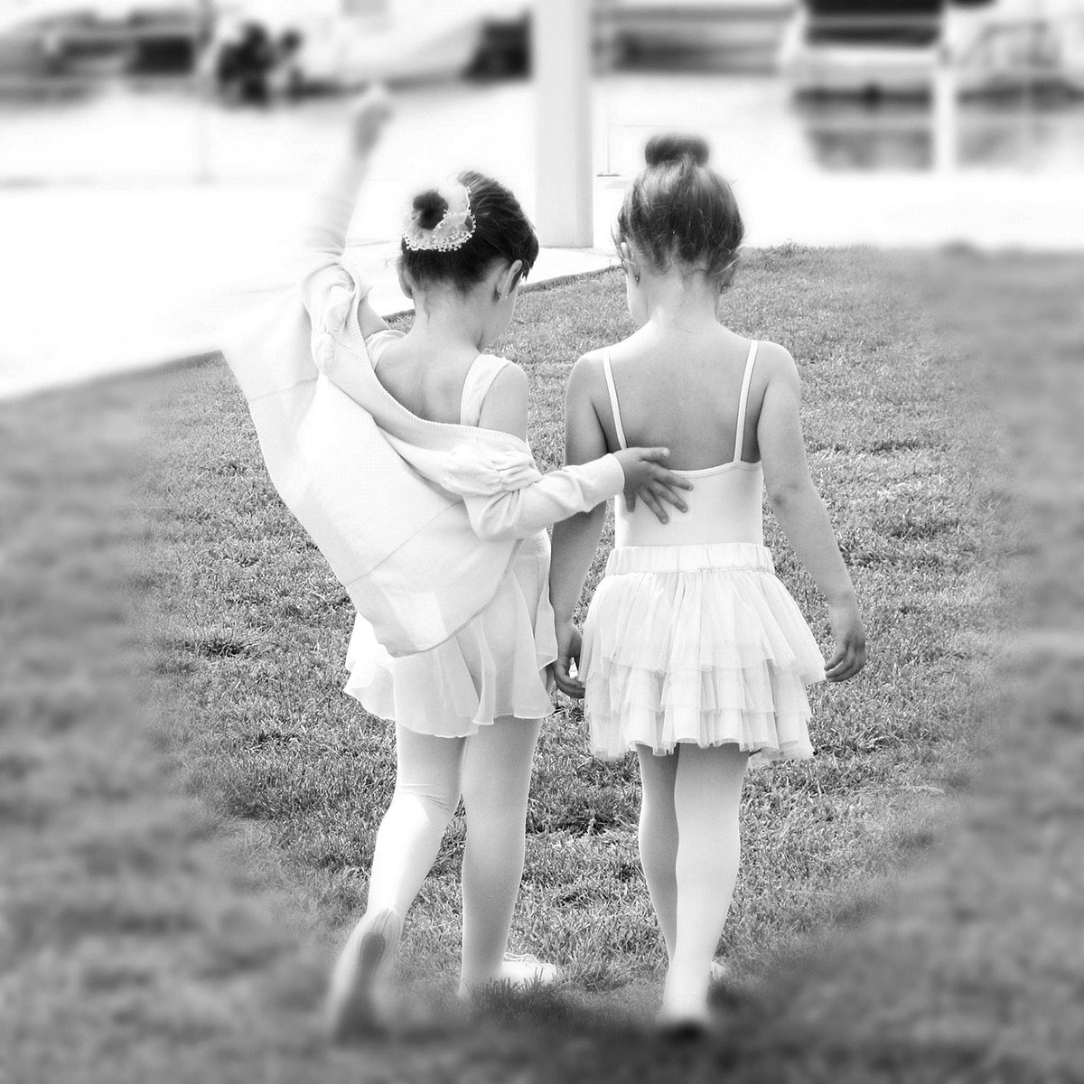 Two ballerina girls walking